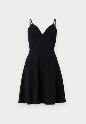 Black sleeveless dress with a V-neckline, fitted bodice, and flared skirt. Made from smooth fabric, featuring thin shoulder straps.