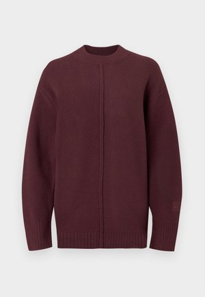 Maglione in maglia color borgogna con scollo rotondo, spalle scese, polsini e orlo a costine, caratterizzato da un delicato dettaglio di cucitura lungo la parte anteriore.