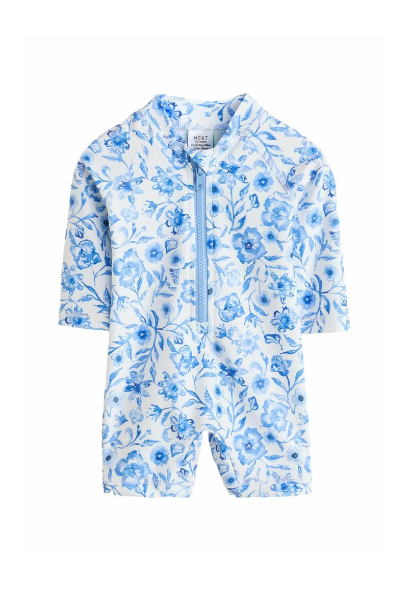 Kupći kostim kratkih rukava s plavim cvjetnim uzorkom na bijeloj pozadini, s prednjim zatvaračem i visokim ovratnikom. Izrađen od rastezljivog materijala.
