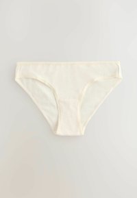Ljuscreamfärgad bomullsbrief med mjuk textur, som har en smal midja och kontrasterande sömmar längs kanterna.