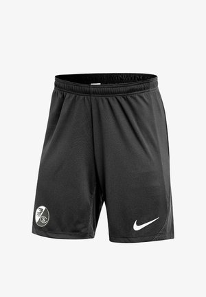 Sorte sportsshorts med elastisk linning, med en hvid Nike-logo på højre ben og et sort-hvidt klubemblem på venstre ben.