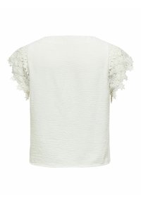 Haut blanc texturé à manches courtes avec des manches en dentelle florale complexe et un ourlet droit, présenté de dos sur un fond uni.