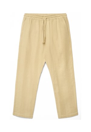 Pantaloni beige in maglia strutturata con vita elastica e coulisse, dotati di tasche laterali e taglio a gamba dritta.