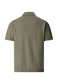 Polo manches courtes vert olive uni en tissu tricoté texturé avec un col standard, vu de dos.