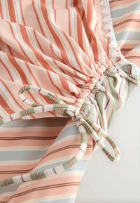 Unselected, peach pink stripe whipstitch