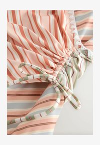 Unselected, peach pink stripe whipstitch