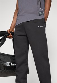Champion ICONS CUFF PANTS - Jogginghose - black