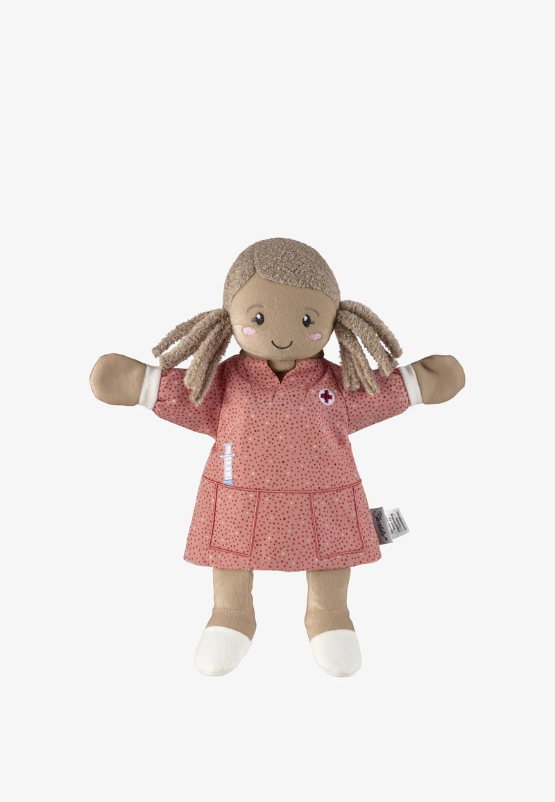 Fabric nurse doll with brown hair in two braids, wearing a pink dotted dress with pockets and a red cross logo, and white shoes.
