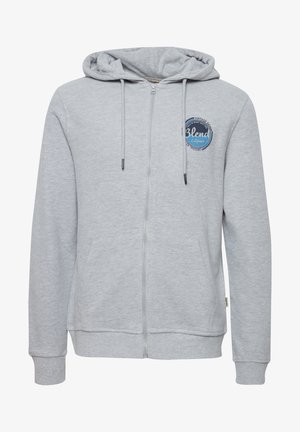 Szara bluza z kapturem na zamek błyskawiczny, z kangurzą kieszenią, kapturem ze sznurkiem i okrągłym logo na lewej piersi. Miękka, teksturowana tkanina.