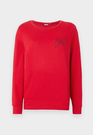 Roter Pullover aus weichem Stoff, mit Rundhalsausschnitt, langen Ärmeln und einem kleinen schwarzen gestickten "Gap"-Logo auf der Brust.
