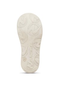 White shoe insole with a textured surface featuring circular designs and the word "Nativino." Size 20 marked prominently.