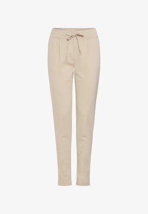 Bež hlače za prosti čas z elastičnim pasom, nastavljivo vrvico, dvema sprednjima žepoma in ožjim krojem. Mehka, gladka tekstura tkanine.