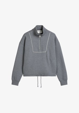 Gray cropped sweatshirt with a stand-up collar and quarter zip. Features white piping detail, elastic cuffs, and adjustable drawstring hem.