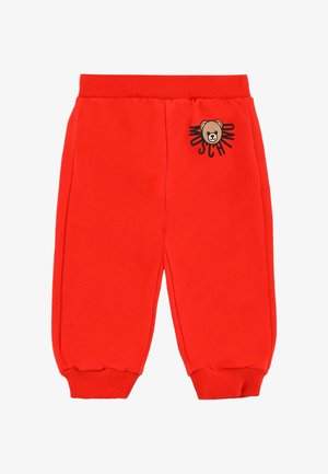 Rode sweatpants van katoen, met een elastische tailleband en boorden, voorzien van een beerafbeelding en tekst aan de voorkant links.