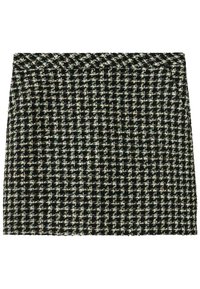 Gonna mini in bianco e nero a motivo houndstooth, realizzata in tessuto intrecciato, con una forma strutturata e una vita senza chiusure visibili.