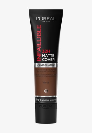 Fond de teint L’Oréal Infallible 32H Matte Cover dans un tube noir avec du texte rouge, présente un SPF 25 et un sous-ton neutre—teinte 380.