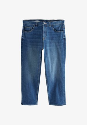 Kényelmes fazonú kék farmernadrág, öt zsebbel, cipzáros előrésszel és övhurkokkal. Fényes elszíneződés és tónusos varrási részletek.