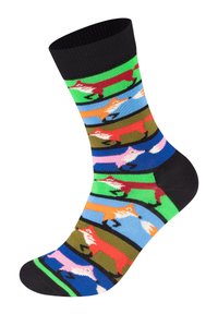 Kolorowe skarpetki z powtarzającym się wzorem lisów w odcieniach pomarańczowego, czerwonego, różowego i białego, na żywych zielonych i niebieskich paskach, z czarnym ściągaczem.