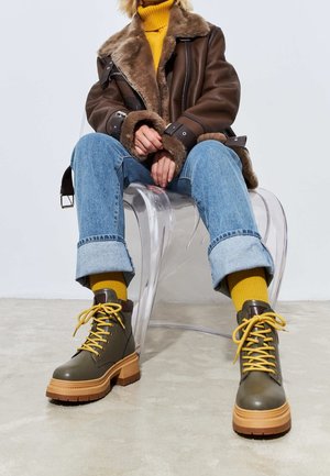 Cesare Gaspari, Bottes de neige - green