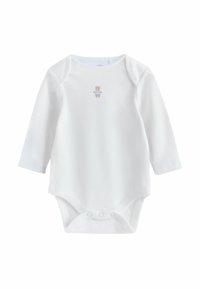 Vit långärmad babybody av mjukt tyg med en liten björnillustration på bröstet och tryckknappar i nederkant.