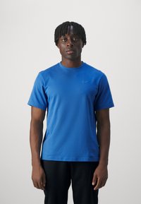 Nike Performance PRIMARY - Spordi T-särk - star blue