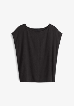 Schwarzes Kurzarm-Top mit lockerer, übergroßer Passform, das aus einem strukturierten Stoff gefertigt ist und einen runden Ausschnitt hat. Schlichtes Design ohne sichtbare Verschlüsse.