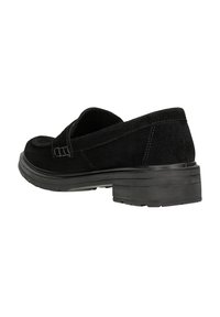 Schwarze Wildlederschlupfschuhe mit runder Zehe und einer niedrigen, strukturierten Gummisohle. Mit Ziernähte entlang der oberen Kante.