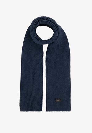 Dunkelblau gestrickter Schal mit gerippter Textur, versehen mit einem kleinen schwarzen Markenlabel. Der Schal ist lang und in einer kreisförmigen Form gewickelt.