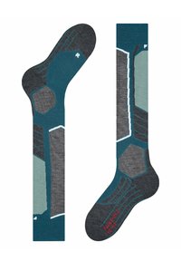 Socken mit einem hexagonalen Muster in Dunkelgrau, Teal und Hellgrau, mit texturierten Akzenten und einem gerippten Bündchen. Größenlabel sichtbar.