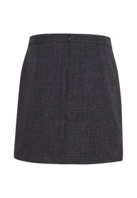 Mini jupe grise foncée en tissu texturé avec des motifs subtils. Elle présente une fermeture éclair dissimulée à l'arrière.