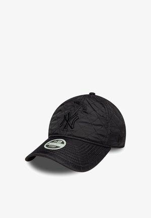 Black quilted baseball cap with embroidered NY logo, curved brim, and adjustable strap; features textured fabric and a round top button.