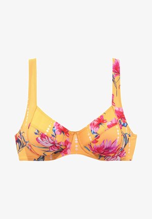 Soutien-gorge floral jaune à larges bretelles, orné de fleurs roses et violettes. Texture lisse, détails en maille et un design structuré avec des motifs en losange.