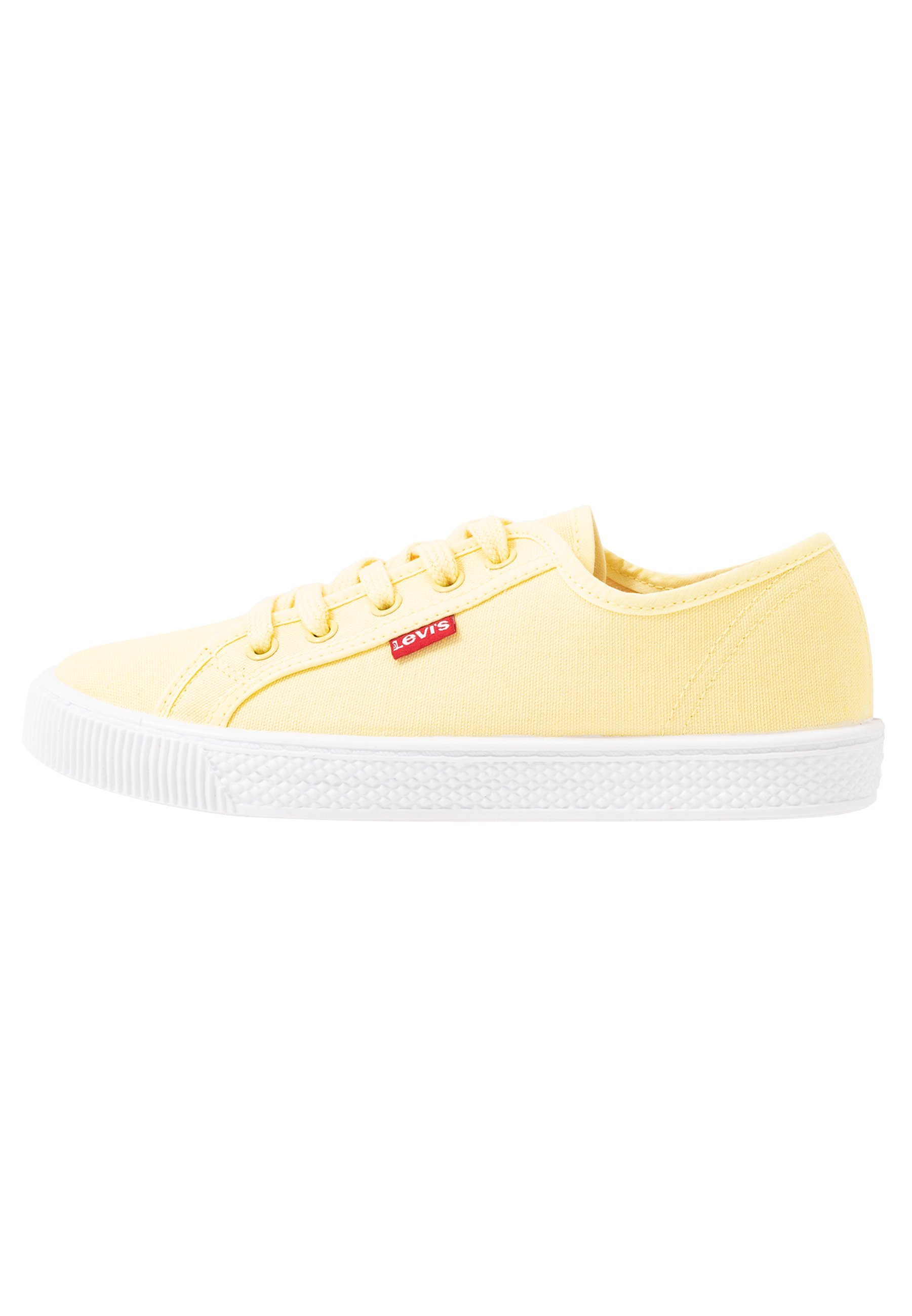 pastel yellow trainers
