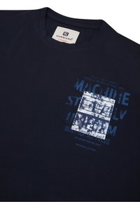 Navy blue cotton t-shirt featuring a rectangular graphic in light blue text and a distressed design, with a round neckline and short sleeves.