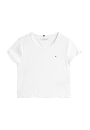 White ribbed t-shirt featuring a round neckline, short ruffled sleeves, and a small logo accent on the chest. Front hem is slightly cropped.