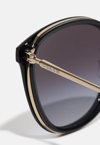 COACH Óculos de sol - light gold-coloured/black