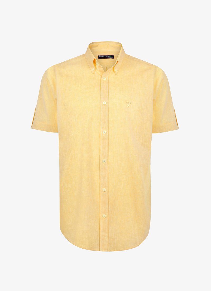 Lühikeste varrukatega nööbiga särk pehmes kollases kangas, millel on delikaatne tekstuur ja väike tikand rinnal.