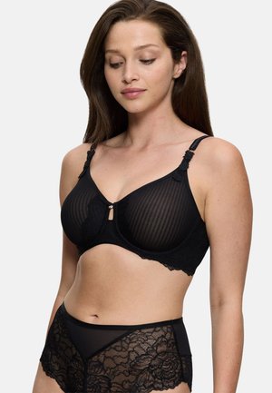 Czarny koronkowy biustonosz z paskowym wzorem, dekoracyjnymi elementami, wycięciem w kształcie klucza na środku i regulowanymi ramiączkami. W komplecie ze spodenkami z koronki o tym samym wzorze.