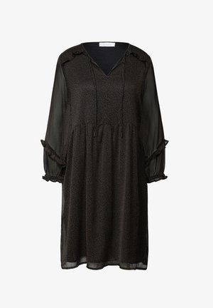 Schwarzes Kleid mit Leopardenmuster. Mit V-Ausschnitt, Kordelzug und Rüschensäumen. Hergestellt aus einem leichten, semitransparenten Stoff.