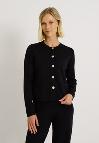 À BOUTONS COL ROND - Chaqueta de punto - noir