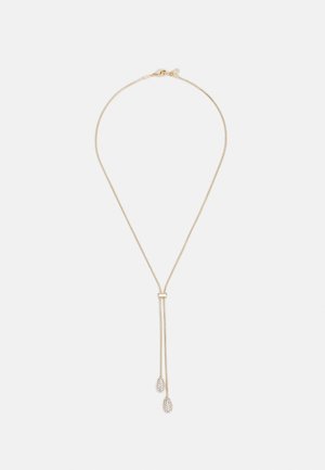 Collier lariat délicat en or avec coulisseur réglable et deux extrémités en forme de larme ornées de petits cristaux.