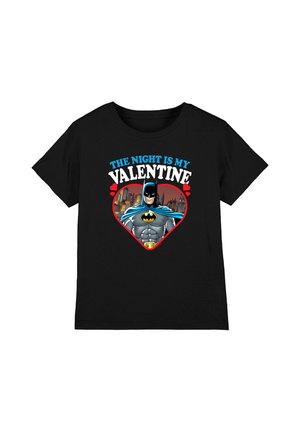 Black T-shirt with Batman inside a heart shape and text "The night is my Valentine" above a cityscape background.