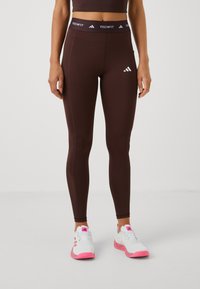 adidas Performance STASH - Legíny - kalhoty  - shadow brown