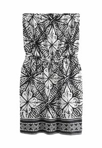 Robes sans bretelles noir et blanc avec un motif floral, dotée d'une taille élastique et d'une bordure imprimée. Le tissu semble léger avec une texture lisse.