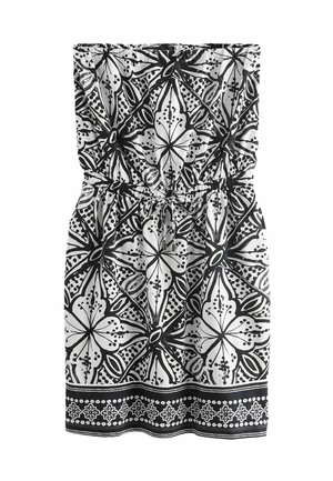 Schwarz-weißes trägerloses Kleid mit floralem Muster, elastischem Bund und bedrucktem Saum. Der Stoff wirkt leicht und hat eine glatte Textur.