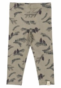 Leggings od svijetlosmeđeg materijala s uzorkom tamnozelenih grana i šišarki. Mekani materijal s elastičnom gumicom u struku i etiketom.