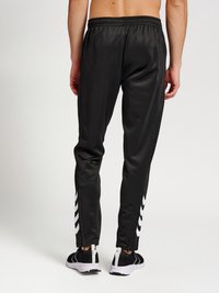 Hummel HMLCORE PANTS - Tréningruha alsók - black