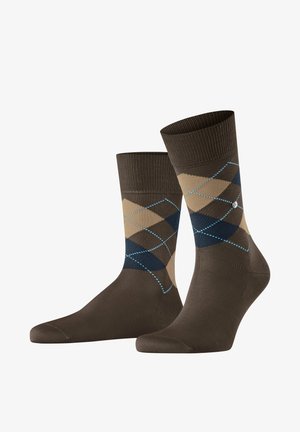 Bruine katoenen sokken met een ruitpatroon in beige en marineblauw, geaccentueerd met lichtblauwe stiksels. Ribbeltop voor een veilige pasvorm.