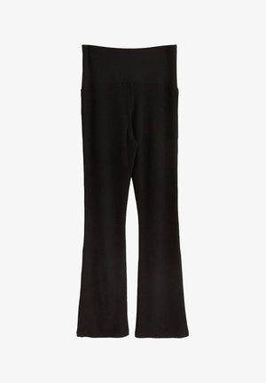 Svarta ribbade utsvängda byxor med hög midja. De stretchiga tygerna ger en åtsittande passform och har en diskret textur genom hela materialet.
