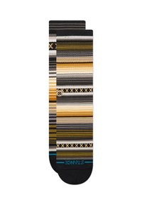 Calcetines a rayas con bandas de negro, gris, amarillo y crema. Diseño texturizado con acentos oscuros en la punta y el tobillo, detalle del logo en azul.
